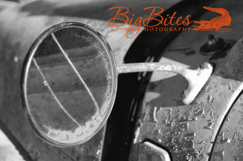 broken-car-mirror-black-and